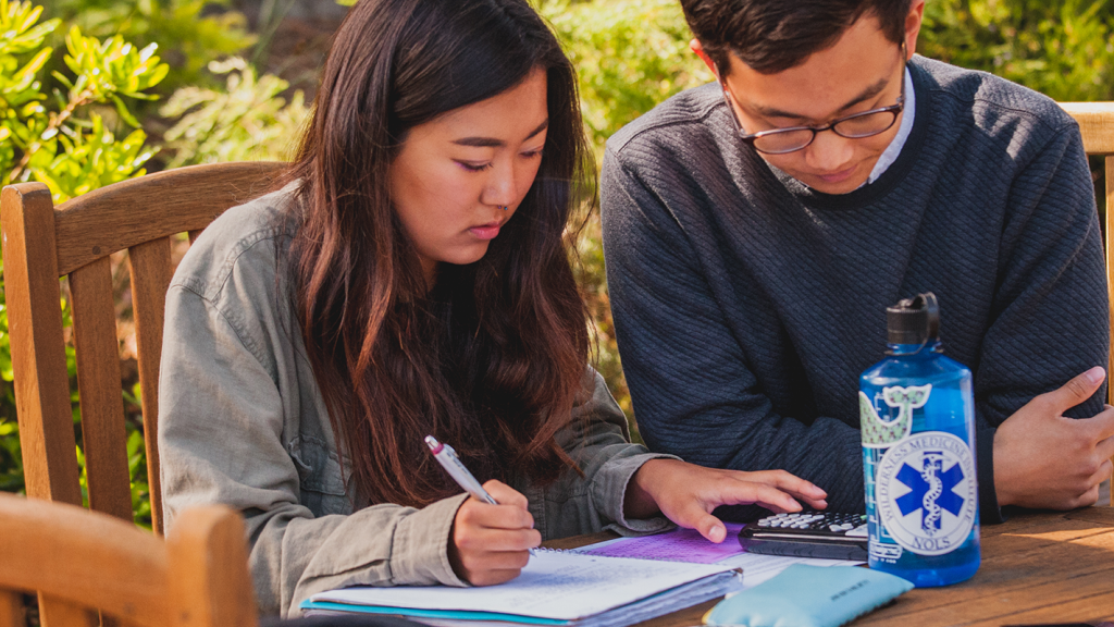 Student getting help from a faculty member.